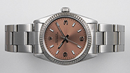 Mid Mid-Size Rolex Oyster Perpetual Salmon Pink Dial 77014