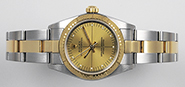 Ladies Rolex Oyster Perpetual 18K/SS Champagne Zephyr Dial 76243