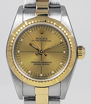 Ladies Rolex Oyster Perpetual 18K/SS Champagne Zephyr Dial 76243