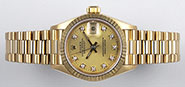 Ladies 18K Rolex Oyster Perpetual DateJust - Factory Champagne Diamond-Set Dial 69178