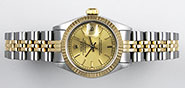 Ladies Rolex Oyster Perpetual 18K/SS Champagne Dial 69173