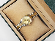 Ladies Rolex Oyster Perpetual DateJust 18K/SS Champagne Dial 179173