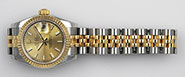 Ladies Rolex Oyster Perpetual DateJust 18K/SS Champagne Dial 179173