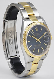 Rolex Oyster Perpetual Date 15223 - Dark Blue Gilt Dial