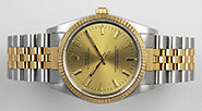 Rolex Oyster Perpetual DateJust 14233 - Metallic Champagne Dial