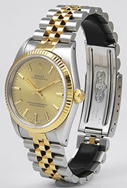 Rolex Oyster Perpetual DateJust 14233 - Metallic Champagne Dial